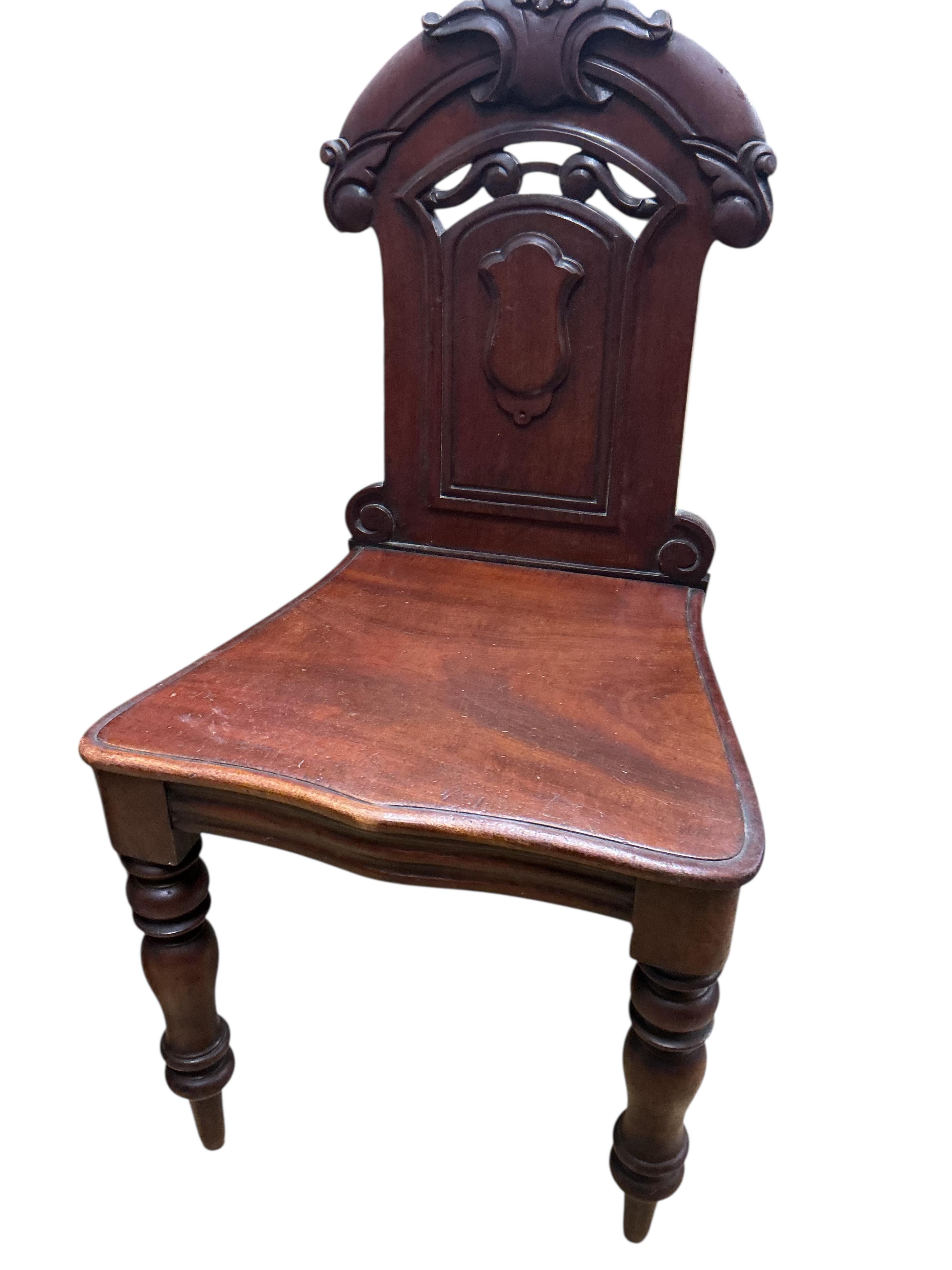 Three (two plus one) Victorian mahogany hall chairs, larger width 43cm, height 90cm